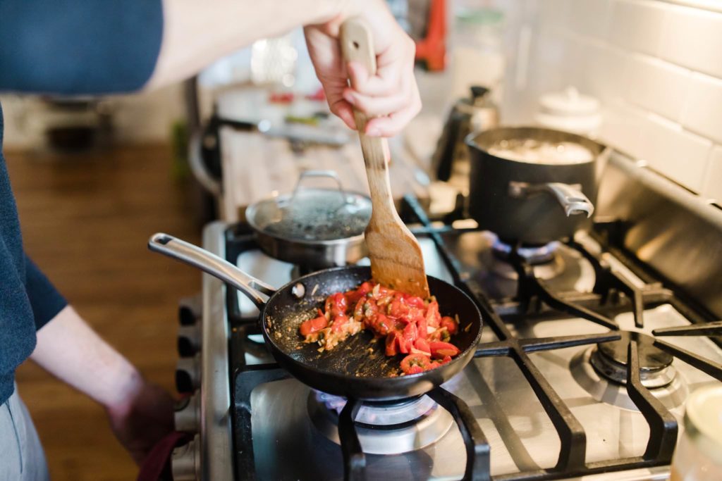 cooking at home engagement photos